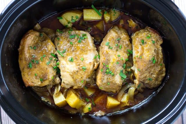 Slow Cooker Pork Chops & Potatoes • Dishing Delish
