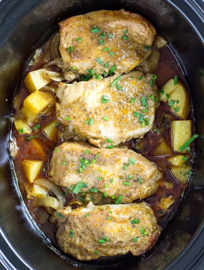 Slow Cooker Pork Chops & Potatoes • Dishing Delish