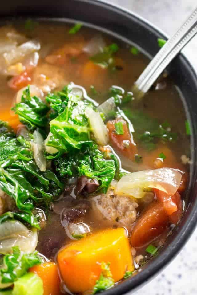 Slow Cooker Kale Bean & Sausage Soup • Dishing Delish