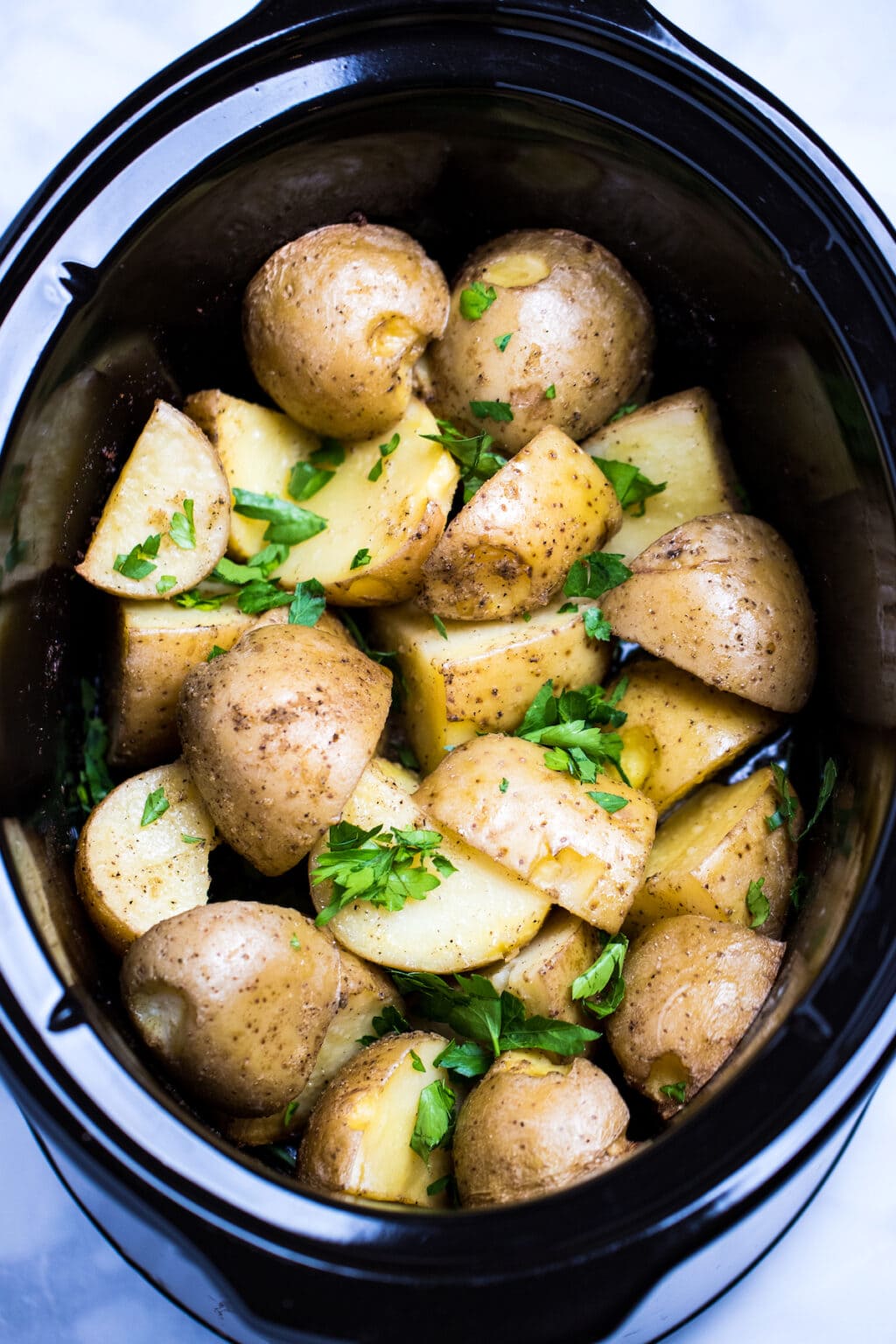 Easy Slow Cooker Potatoes • Dishing Delish