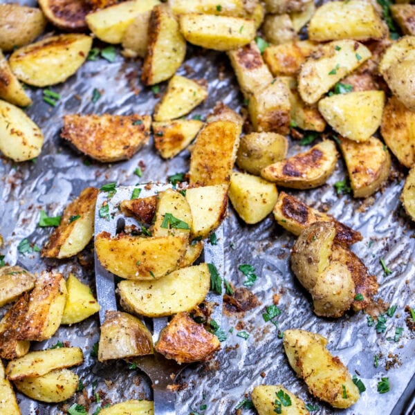 Crispy Garlic Parmesan Roasted Potatoes • Dishing Delish