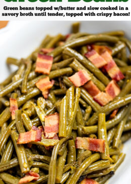 Pinterest pin with a bowl of crockpot green beans on a table topped with bacon.