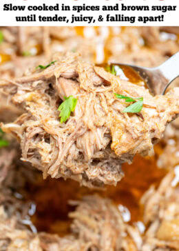 Pinterest pin with a slow cooker full of shredded pork shoulder in broth and drippings, with a spoon lifting some up.