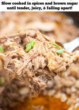 Pinterest pin with a slow cooker full of shredded pork shoulder in broth and drippings, with a spoon lifting some up.