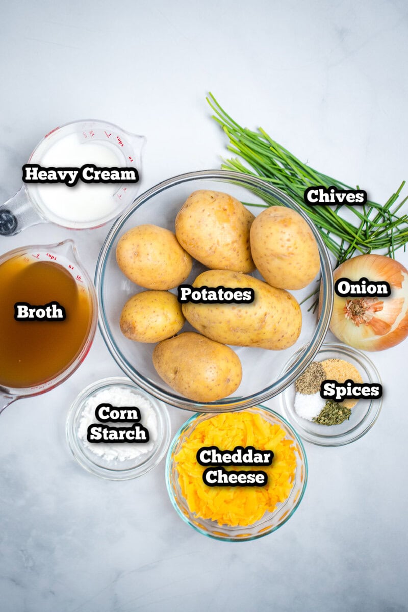 Individual ingredients for slow cooker potato soup on a table.