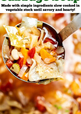 Pinterest pin with a ladle lifting up a serving of slow cooker cabbage soup from the crockpot.