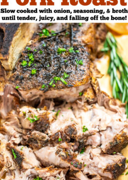 Pinterest pin with a pork roast on a cutting board topped with fresh parsley, next to fresh rosemary, with the front part of the roast shredded.