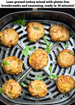 Pinterest pin with air fryer turkey meatballs in an air fryer basket after being cooked. They're brown and caramelized and topped with fresh parsley.