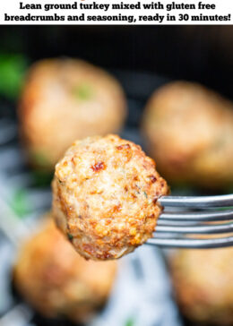 Pinterest pin with a fork holding an air fryer turkey meatball over an air fryer basket with other meatballs in the background.