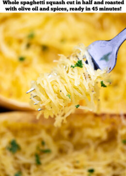 Pinterest pin with a fork with spaghetti squash noodles being held above two halves of cooked spaghetti squash, topped with fresh chopped parsley.